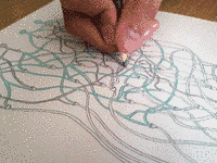 a human coloring the wires according to the logic rules